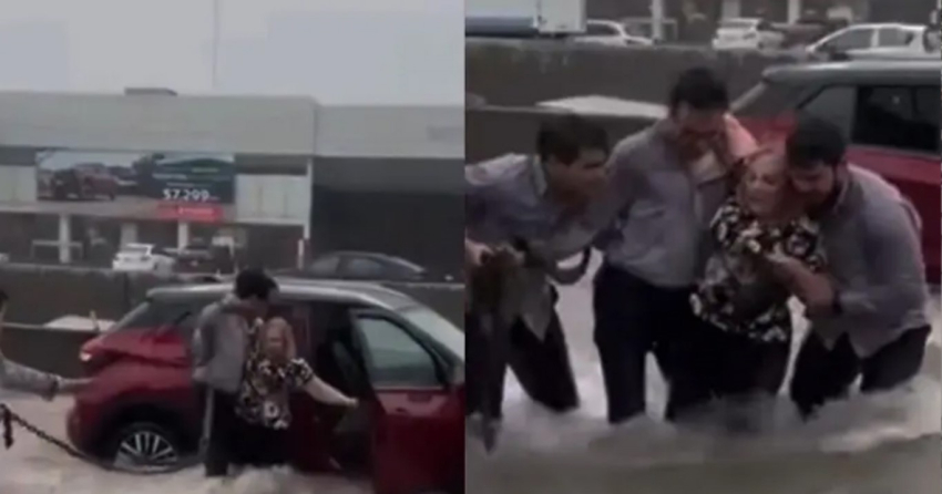 Rescatan a mujer que quedó atrapada en camioneta durante inundación en Monterrey