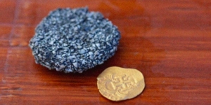 Encuentran moneda en el fondo del oc&eacute;ano con valor de 2 mdp